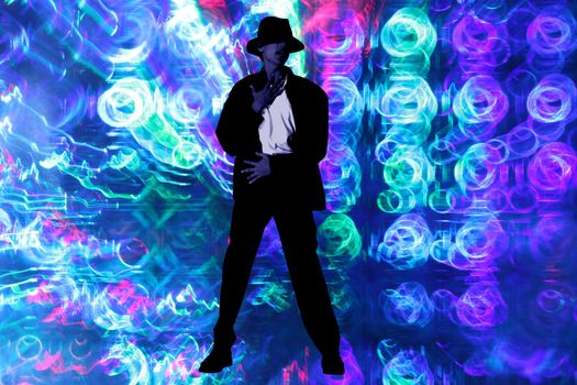 An abstract background of a Michael Jackson like dancer on pattern of colorful disco lights.