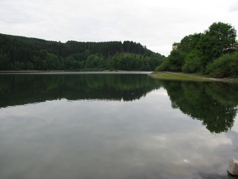 Lake with reflexion of the shore