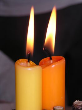 two atmospheric candles at a celebration