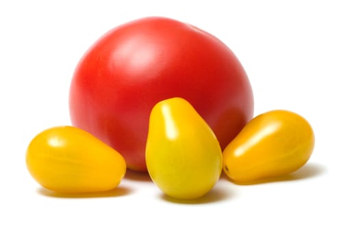 Yellow and red tomatoes isolated on white background.