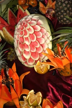 Decorated fruits out on the display at a fruit stall.