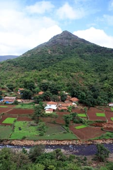 A beautiful Indian village situated in a valley in the high mountains.