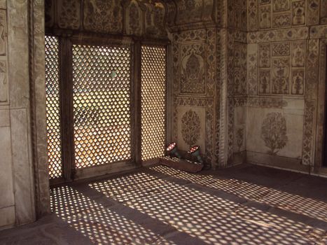 Sunlight coming in from Marble crafted palace Diwan-i-Khas of Red Fort in Delhi, India.
