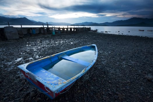 Old fish-boat on beach. 