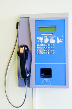 Shot of blue public card telephone, telecommunications