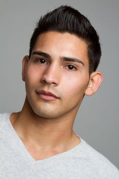 Young hispanic man closeup headshot