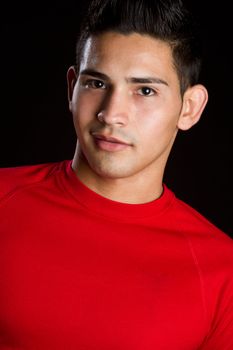 Smiling hispanic young man closeup