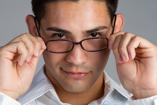 Young hispanic man wearing glasses