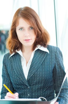 Shot of beautiful business woman in interior