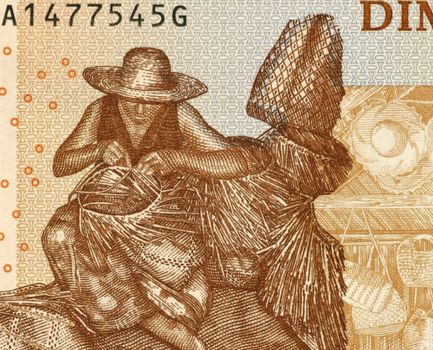 Man Weaving Basket on 500 Ariary 2004 Banknote from Madagascar.