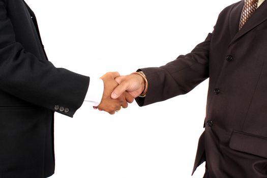 The handshake of a two Indian businessman after a successful deal, on white studio background.