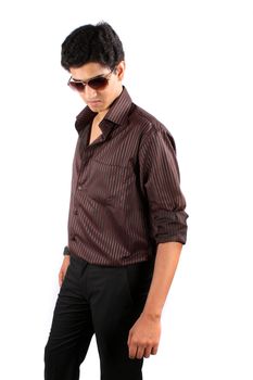 A stylish Indian model wearing sunglasses, posing on white studio background.