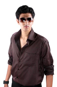 A portrait of a smart Indian guy wearing sunglasses, on a white studio background.