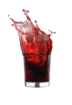 Glass of splashing cherry juice isolated on white background with clipping path