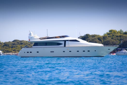 Luxury yacht in a bay on a hot summer day