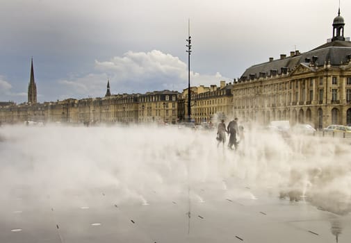 Misty Place De La Bourse in Bordeaux, France. A Unesco World Heritage Site.