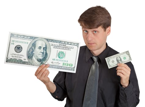 A young man holding a large and small money on white