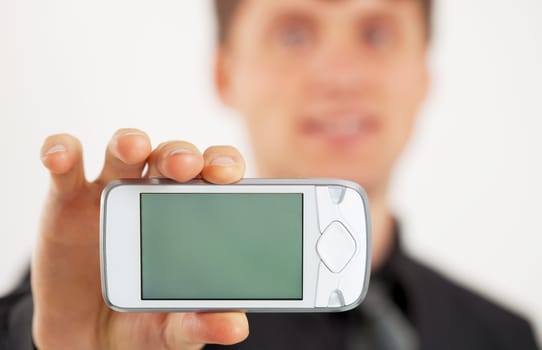 Man shows LCD screen of white mobile phone