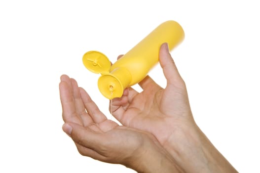 bottle of gel in his hands on a white background