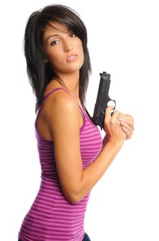 attractive hispanic woman holding a gun on a white background