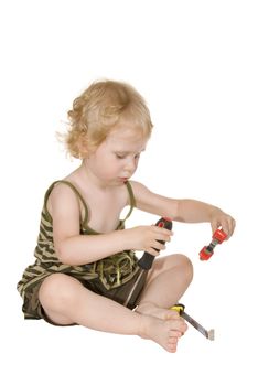 girl with a screwdriver pliers and a tape measure on a white background