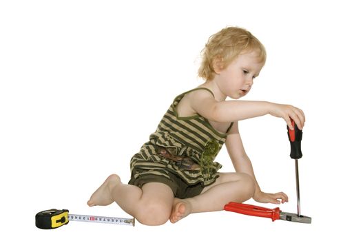 girl with a screwdriver pliers and a tape measure on a white background