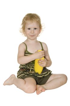 girl with a bottle of shampoo on a white background