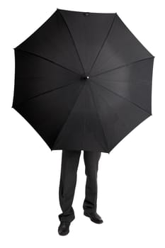The man hid behind a large black umbrella