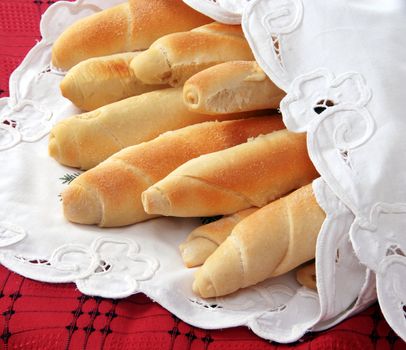 heap of appetizing homemade bread rolled loaves