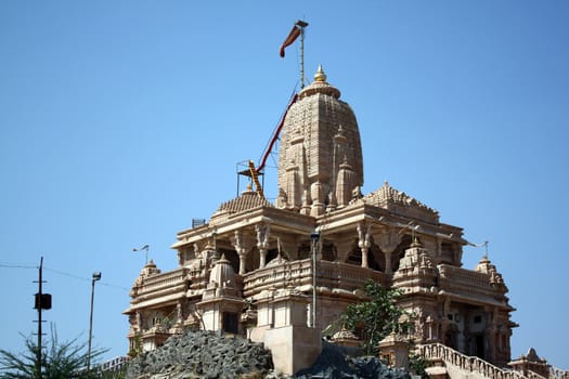 A beautiful Jain temple built on a rocky hill.