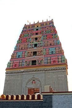 A beautiful dome of an Indian temple with colorful artwork.