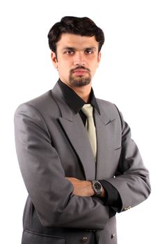 A smart Indian businessman, isolated on a white studio background.