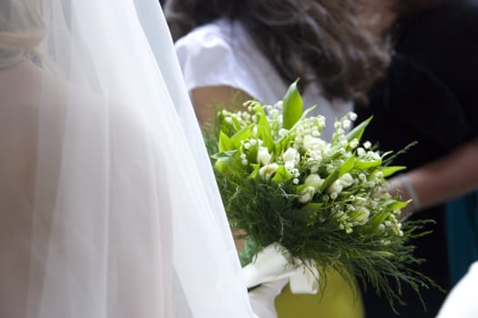 Particular view of a bride dress during the wedding