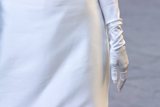 Particular view of a bride dress during the wedding