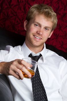 Young man drinking alcohol