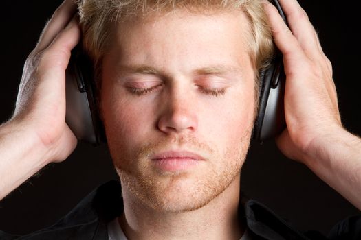 Boy listening to headphones music