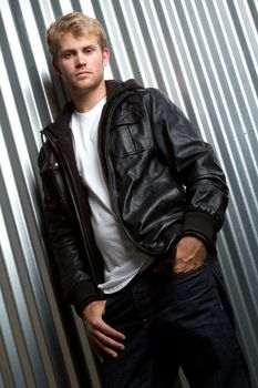 Young man wearing leather jacket