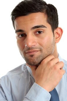 Confident businessman thinking, considering and smiling.  Closeup, white background.