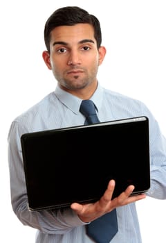 Businessman holding an open laptop.  White background