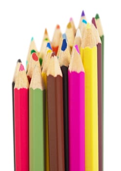 A set of colored wooden pencils isolated on a white background