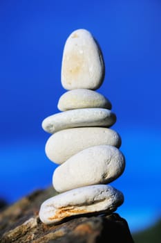 Pile of the stones against the blue sky