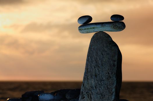 Model of Scales against the evening sky