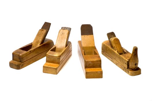 Old wooden planes it is isolated on a white background.