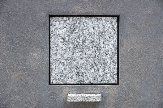 A blank square tombstone ready for your inscription