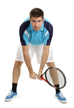 Photo of an attractive male tennis player waiting for the serve.  Full body shot with slight shadow around shoes.