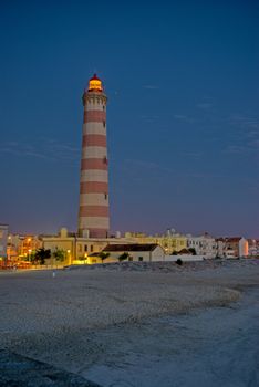 Lighthouse in Aveiro, Portugal - Barra beach at night.