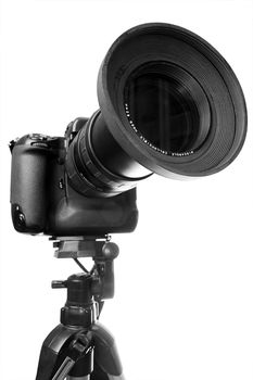 Professional digital camera over white background.