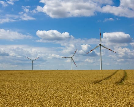 Wind farm under blue sky