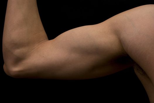 muscular arm isolated over blacj background