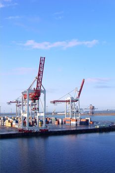 harbor crane over blue sky stock photo